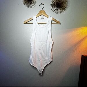 NWT Free people ribbed racer back body suit